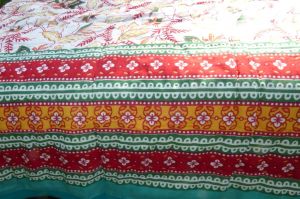 Quilt 'Blockprint' mit zwei Schauseiten - türkisgrün-rot-gelb