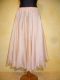 Tellerrock Chiffon beige mit Goldborte