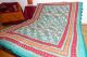 Quilt 'Blockprint' mit zwei Schauseiten - türkisgrün-rot-gelb