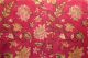 Baumwollstoff 'Jaipur' rubinrot mit floralen Mustern in rosé und hellgrün
